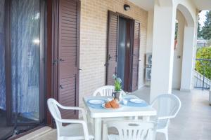 A balcony or terrace at Homiday - Residence Micaene