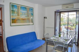 A seating area at Homiday - Residence Micaene