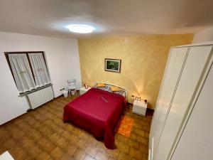 Un pat sau paturi într-o cameră la CASA AL PINO