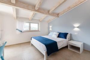 Posteľ alebo postele v izbe v ubytovaní LeMoon Holiday Home x7 con Terrazzo e Parcheggio - Sorrento Coast