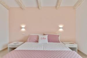 Posteľ alebo postele v izbe v ubytovaní LeMoon Holiday Home x7 con Terrazzo e Parcheggio - Sorrento Coast