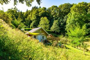Zahrada ubytování Les Cabanes d'Hestia