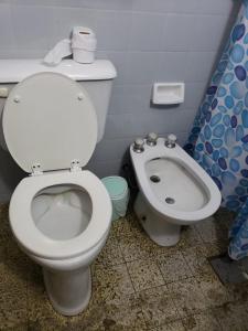 a bathroom with a toilet and a bidet at La MARGARITA in San Rafael