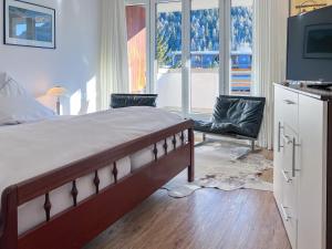 Postel nebo postele na pokoji v ubytování Designer Küche - Südbalkon - TG-Stellplatz - WLAN