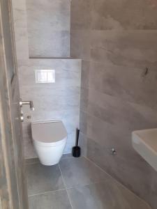 Kúpeľňa v ubytovaní Apartment Lizzi.