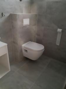 Kúpeľňa v ubytovaní Apartment Lizzi.