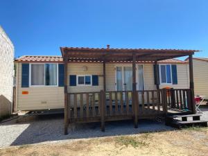 a mobile home with a gazebo at Chiclana Mobile House - Piscina , Wi-Fi, Relax in Chiclana de la Frontera