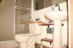 Koupelna v ubytování AlohaT Habitaciones