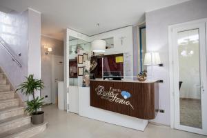 a lobby with a reception desk in a building at Hotel Perla Dello Ionio in Torre Lapillo