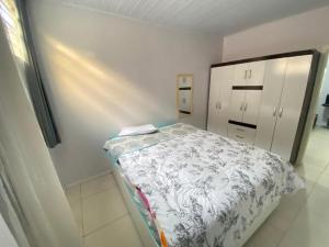 En eller flere senge i et værelse på Hotel Veneza Scorsatto + 17 billeder