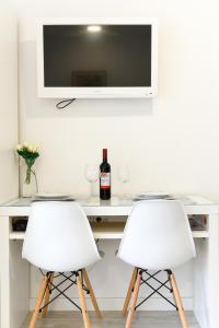 TV a/nebo společenská místnost v ubytování Apartments Villa Pina