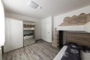 Posteľ alebo postele v izbe v ubytovaní Apartmán Pod Sněžníkem