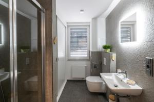Kúpeľňa v ubytovaní Apartmán Pod Sněžníkem + 18 fotografií