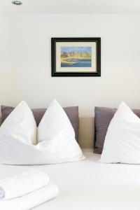 Postel nebo postele na pokoji v ubytování Apartments Villa Pina