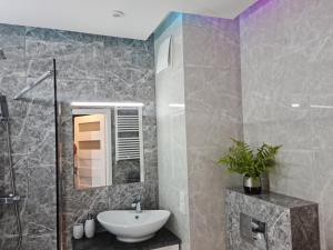 Kúpeľňa v ubytovaní Fala Bałtyku Apartament Nadmotławie + 15 fotografií