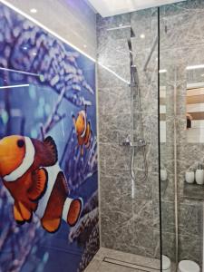Kúpeľňa v ubytovaní Fala Bałtyku Apartament Nadmotławie