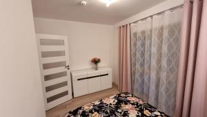 Posteľ alebo postele v izbe v ubytovaní Fala Bałtyku Apartament Nadmotławie