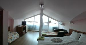 Postel nebo postele na pokoji v ubytování Guest House Rosa