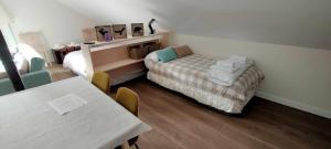 A bed or beds in a room at Casa Cotefablo Aloj Sorrosal Gavin Biescas