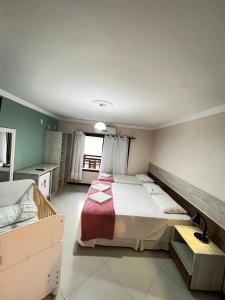Postel nebo postele na pokoji v ubytování Pousada Café