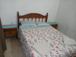 En eller flere senge i et værelse på FINCA LA CASA AMARILLA