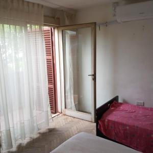 Giường trong phòng chung tại Amplio 2 Dormitorios en Cofico