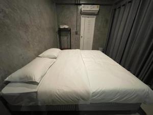 Voodi või voodid majutusasutuse Por Sampao Camp&Resort toas