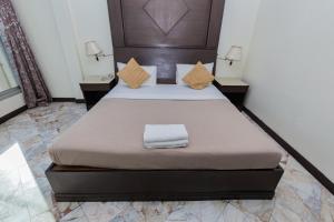Säng eller sängar i ett rum på Mix Hotel