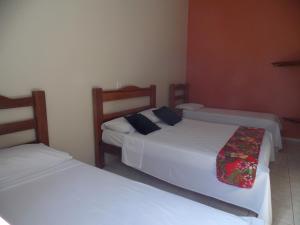 Ein Bett oder Betten in einem Zimmer der Unterkunft Águas Vivas Hotel Fazenda