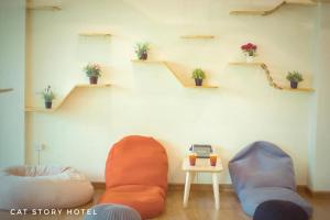 Posezení v ubytování Cat Story Hotel