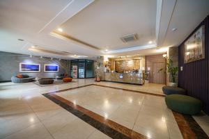 The lobby or reception area at Lamer Hotel