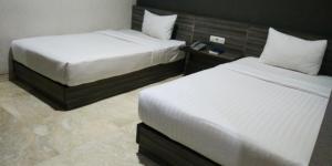 Letto o letti in una camera di Tulip Guest House