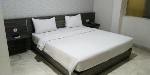 Letto o letti in una camera di Tulip Guest House