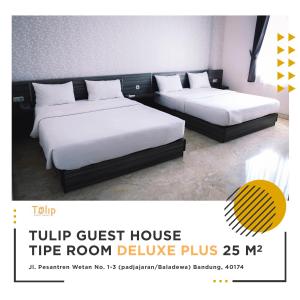 Letto o letti in una camera di Tulip Guest House