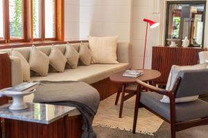 Posezení v ubytování La Chronique Hotel
