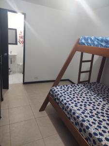 Giường trong phòng chung tại Apartasol Ciudadela Santa Fé +10 ảnh