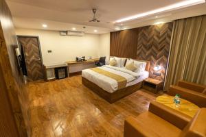 Postel nebo postele na pokoji v ubytování Clarks Inn , Airport Bangalore + 37 fotografií