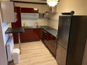 Dapur atau dapur kecil di schicke Wohnung im Grünen