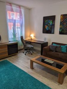 Χώρος καθιστικού στο Stylisches 2 Zimmer Apartment zum Abschalten