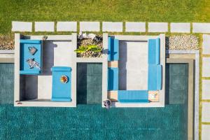 an overhead view of a house with a pool at Sani Verde in Sani Beach +38 photos