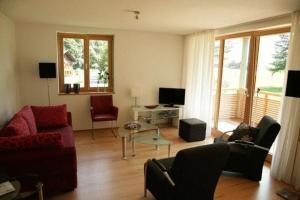 Televízia a/alebo spoločenská miestnosť v ubytovaní Haus Kanisblick Appartements