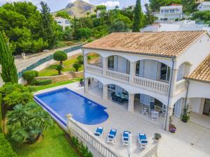 an aerial view of a house with a swimming pool at Villa Bonaire in Alcudia