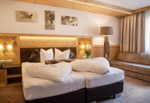 Postel nebo postele na pokoji v ubytování Hotel Victoria
