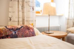 Posteľ alebo postele v izbe v ubytovaní Haus Standlgut Rauris -- incl Sommercard