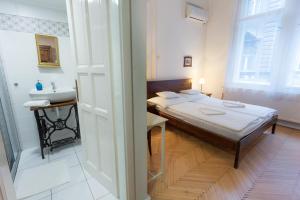 Posteľ alebo postele v izbe v ubytovaní A10 Budapest Center Aparthotel