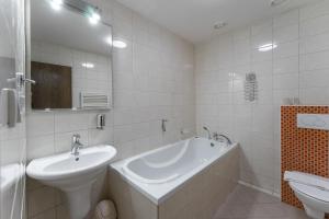 Koupelna v ubytování Hotel Amco