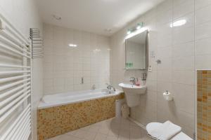 Koupelna v ubytování Hotel Amco