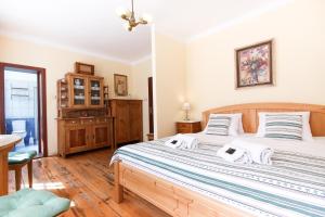 Uma cama ou camas num quarto em (Ne)vinná kavárna