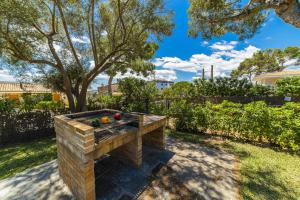 Vonkajšia záhrada v ubytovaní Villa Alcanada Garden