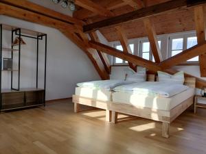מיטה או מיטות בחדר ב-Ferienwohnung "Am Oberen Tor"